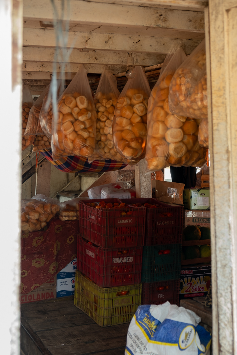 Passengers and crew surrounding the Aquidaban cargo boat moored at Concepción port, Río Paraguay, Paraguay
