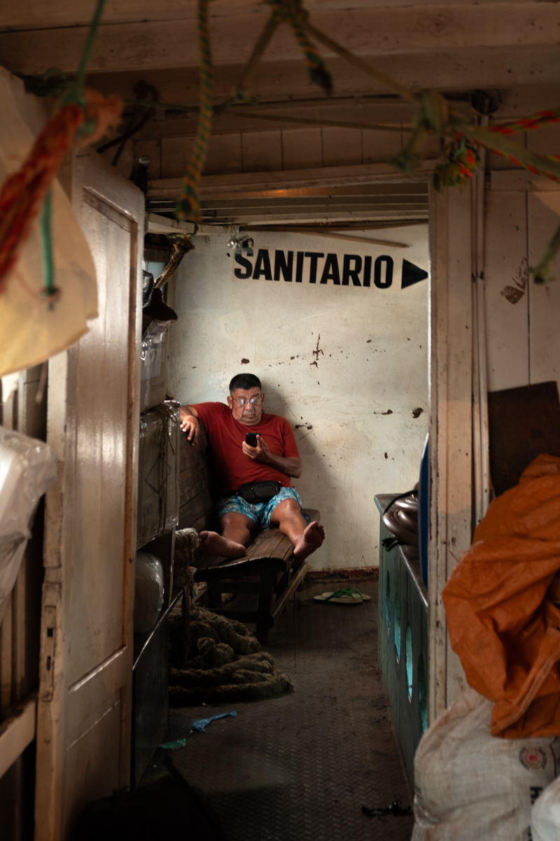 View from the bow of the Aquidaban navigating the Río Paraguay under stormy skies, Paraguay