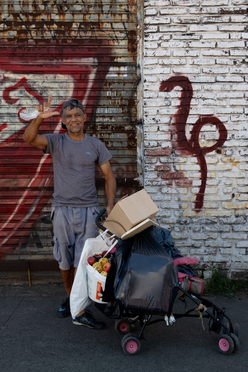 Massive carro loaded with white sacks of collected materials on a Buenos Aires street