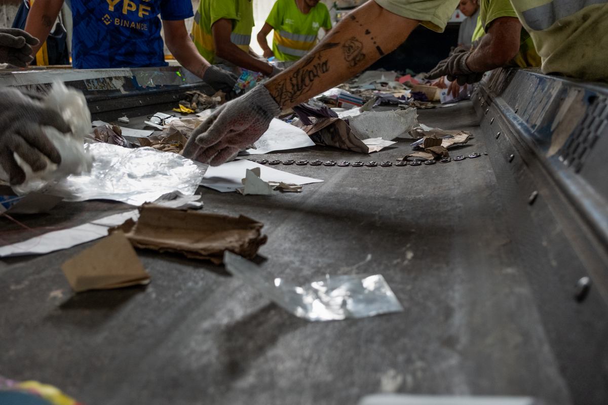 Large pile of discarded cardboard boxes left on a Buenos Aires pavement awaiting collection